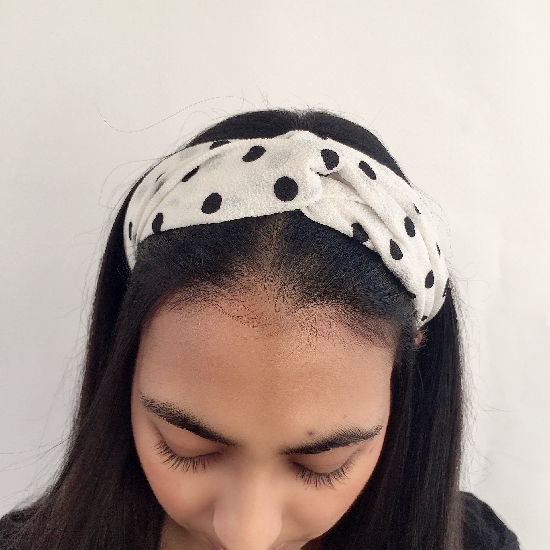 White and black polka dot headband (not an Alice Band)