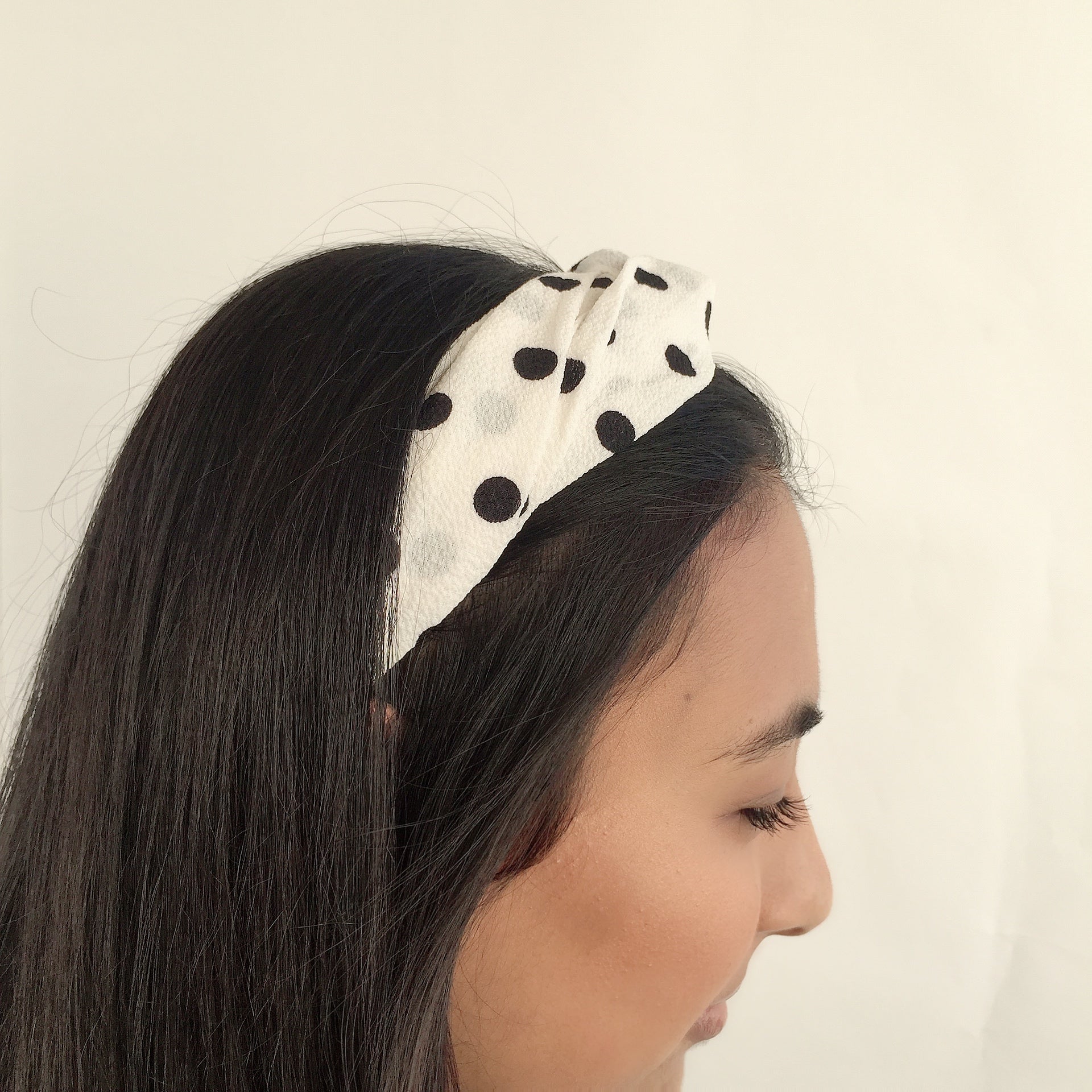 White and black polka dot headband (not an Alice Band)